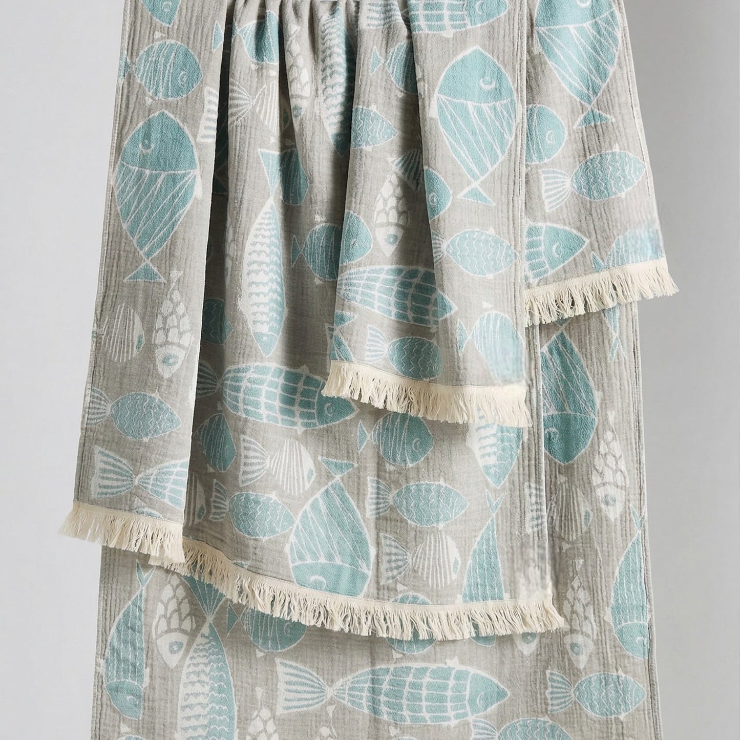 Fish Pattern 3-Layer Turkish Towel – Jacquard Woven Muslin Beach Towel on a plain background